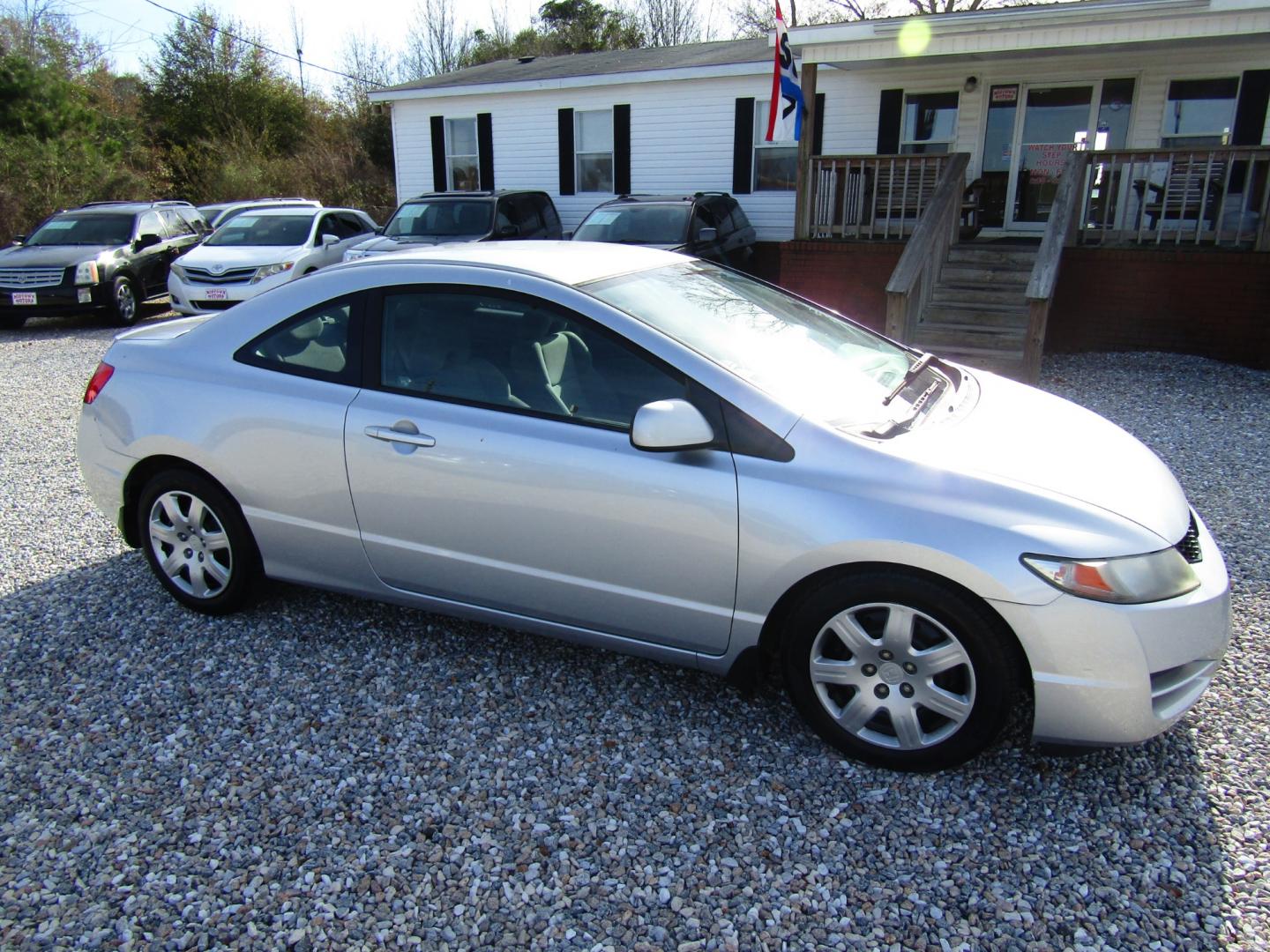 2011 Silver Honda Civic LX Coupe 5-Speed AT (2HGFG1B66BH) with an 1.8L L4 SOHC 16V engine, Automatic transmission, located at 15016 S Hwy 231, Midland City, AL, 36350, (334) 983-3001, 31.306210, -85.495277 - Photo#0